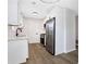 Modern kitchen featuring stainless steel appliances and white shaker cabinets at 6231 Creekford Dr, Lithonia, GA 30058