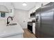 Bright kitchen with white cabinets and stainless steel appliances at 6231 Creekford Dr, Lithonia, GA 30058