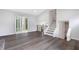 Bright living area with hardwood floors and access to back deck at 6231 Creekford Dr, Lithonia, GA 30058