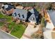 Aerial view of the front of the home and manicured lawn at 1449 Brentford Cv, Snellville, GA 30078