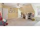 Bonus room features angled ceilings and a great area for work or play at 1449 Brentford Cv, Snellville, GA 30078