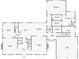 Detailed floor plan showcasing the layout of the first floor with spacious living areas and a primary bedroom suite at 1449 Brentford Cv, Snellville, GA 30078