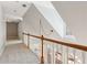 Hallway showing the staircase and balcony at 1449 Brentford Cv, Snellville, GA 30078
