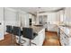 Spacious kitchen features a large island with seating, stainless appliances, and plenty of storage at 1449 Brentford Cv, Snellville, GA 30078