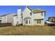 House with large backyard and wooden fence at 1762 Wood Stork Dr, Hampton, GA 30228