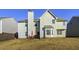 House with large backyard and wooden fence at 1762 Wood Stork Dr, Hampton, GA 30228