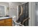 Bathroom with shower/tub combo and wood-look floors at 1762 Wood Stork Dr, Hampton, GA 30228