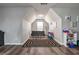 Bonus room with wood flooring and a seating area at 1762 Wood Stork Dr, Hampton, GA 30228