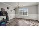 Bright dining room with chandelier and wood-look floors at 1762 Wood Stork Dr, Hampton, GA 30228