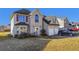 Brick two-story house with a two-car garage and landscaped lawn at 1762 Wood Stork Dr, Hampton, GA 30228