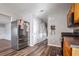 Kitchen with stainless steel refrigerator and wood cabinets at 1762 Wood Stork Dr, Hampton, GA 30228