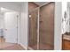 Clean bathroom with a walk-in shower and tile surround at 2950 Mount Wilkinson Se Pkwy # 304, Atlanta, GA 30339