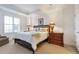Relaxing Primary bedroom with plush bedding and ample natural light at 2950 Mount Wilkinson Se Pkwy # 304, Atlanta, GA 30339
