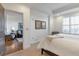 Bright bedroom with a view of the living room and hardwood floor at 2950 Mount Wilkinson Se Pkwy # 304, Atlanta, GA 30339