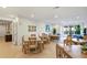 Bright community room with tables, chairs, and comfortable seating at 2950 Mount Wilkinson Se Pkwy # 304, Atlanta, GA 30339