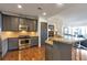 Modern kitchen with granite countertops and stainless steel appliances at 2950 Mount Wilkinson Se Pkwy # 304, Atlanta, GA 30339