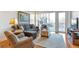 Relaxing living room with hardwood floors and access to balcony at 2950 Mount Wilkinson Se Pkwy # 304, Atlanta, GA 30339