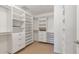 Large walk-in closet with ample shelving and drawers at 2950 Mount Wilkinson Se Pkwy # 304, Atlanta, GA 30339