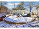Backyard patio area with stone border and a comfortable outdoor seating arrangement at 930 Custer St, Atlanta, GA 30354
