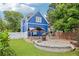 Spacious backyard with a stone patio, gazebo, and well-manicured lawn, perfect for outdoor gatherings at 930 Custer St, Atlanta, GA 30354