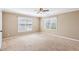 Spacious bedroom featuring two windows and neutral carpeting at 930 Custer St, Atlanta, GA 30354