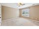 Spacious bedroom featuring a large window and neutral carpeting at 930 Custer St, Atlanta, GA 30354