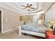 Spacious main bedroom with a trey ceiling, carpeted floors, and lots of natural light at 930 Custer St, Atlanta, GA 30354
