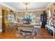 Elegant dining room featuring hardwood floors, decorative lighting, and beautiful furnishings at 930 Custer St, Atlanta, GA 30354