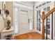 Elegant foyer with hardwood floors, a staircase, and lots of natural light at 930 Custer St, Atlanta, GA 30354