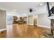 Spacious living room flows into the kitchen, featuring an eat-in island and hardwood floors at 930 Custer St, Atlanta, GA 30354