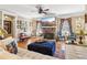 Bright living room features a stone fireplace, hardwood floors, and plenty of natural light at 930 Custer St, Atlanta, GA 30354