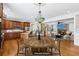 Open-concept living space with kitchen, dining area, and living room seamlessly connected for easy living at 930 Custer St, Atlanta, GA 30354