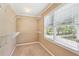 Walk-in closet with a window and wire shelving at 930 Custer St, Atlanta, GA 30354