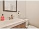 Modern bathroom with single sink vanity and updated fixtures at 21 Ivy Ne Rdg, Atlanta, GA 30342