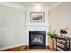 Corner fireplace with a white mantel in the living room at 2130 Weldonberry Ne Dr, Atlanta, GA 30319