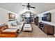 Bonus room with carpet, offering flexible space for a home office and relaxation area at 320 Windermere Dr, Loganville, GA 30052