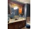 Double vanity bathroom with a large soaking tub at 5680 Cascade Sw Run, Atlanta, GA 30336
