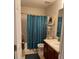 Full bathroom with shower/tub combo and updated vanity at 5680 Cascade Sw Run, Atlanta, GA 30336