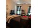 Large bedroom with king-size bed and plenty of natural light at 5680 Cascade Sw Run, Atlanta, GA 30336