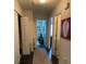 Hallway with access to bedrooms and linen closet at 5680 Cascade Sw Run, Atlanta, GA 30336