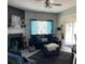 Living Room with grey sofa and teal accents at 5680 Cascade Sw Run, Atlanta, GA 30336
