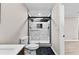 Modern bathroom with a large glass shower, marble tile, and hexagon floor tile at 4145 White Oak Dr, Winston, GA 30187