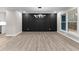 Bright dining room with hardwood floors and a statement wall at 4145 White Oak Dr, Winston, GA 30187