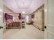 Bedroom with canopy bed and purple walls at 4787 Northside Dr, Atlanta, GA 30327