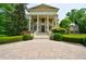 Impressive mansion featuring a classical facade and stone driveway at 4787 Northside Dr, Atlanta, GA 30327