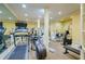 Spacious home gym, fully equipped with cardio and strength training machines at 4787 Northside Dr, Atlanta, GA 30327