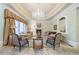 Living room with ornate ceiling, comfortable seating, and fireplace at 4787 Northside Dr, Atlanta, GA 30327