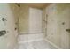 Large multi-head shower with built-in bench seating at 4787 Northside Dr, Atlanta, GA 30327