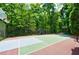 Multi-purpose sports court with basketball and tennis areas at 4787 Northside Dr, Atlanta, GA 30327