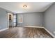 Bedroom with a large sliding door closet and hardwood floors at 54 Cross Branches, Acworth, GA 30101